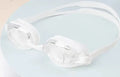 Black swimming goggles with corrective lenses next to a protective case.
