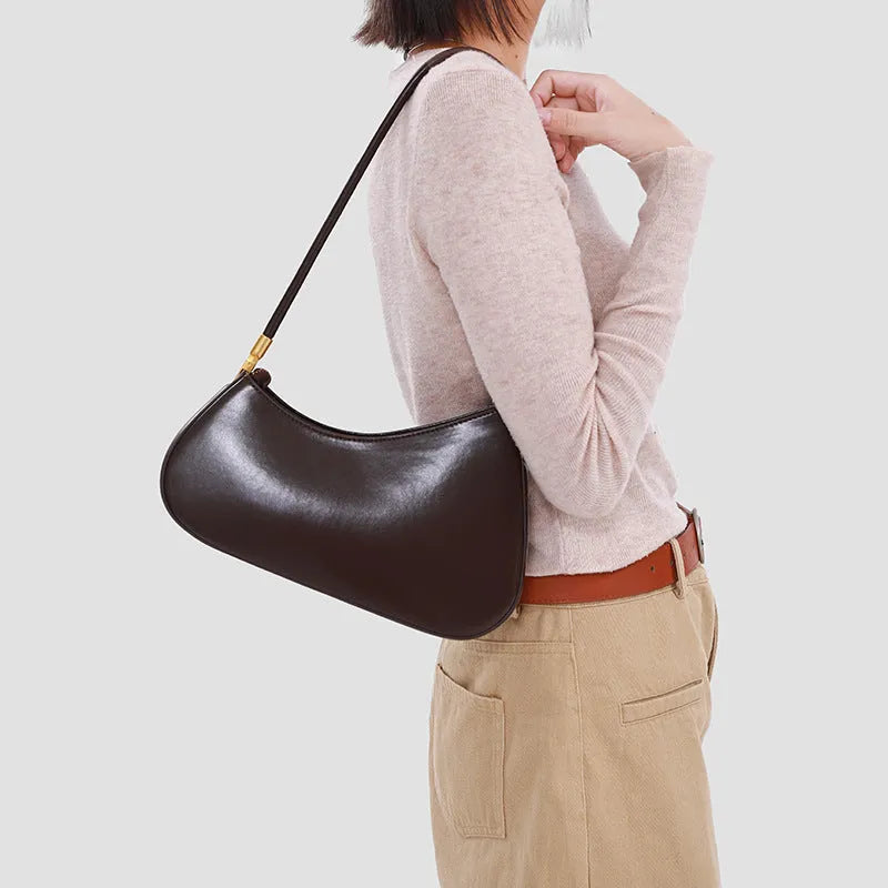 Oval retro commuter underarm handbag in PU leather available in seven colours with single shoulder strap