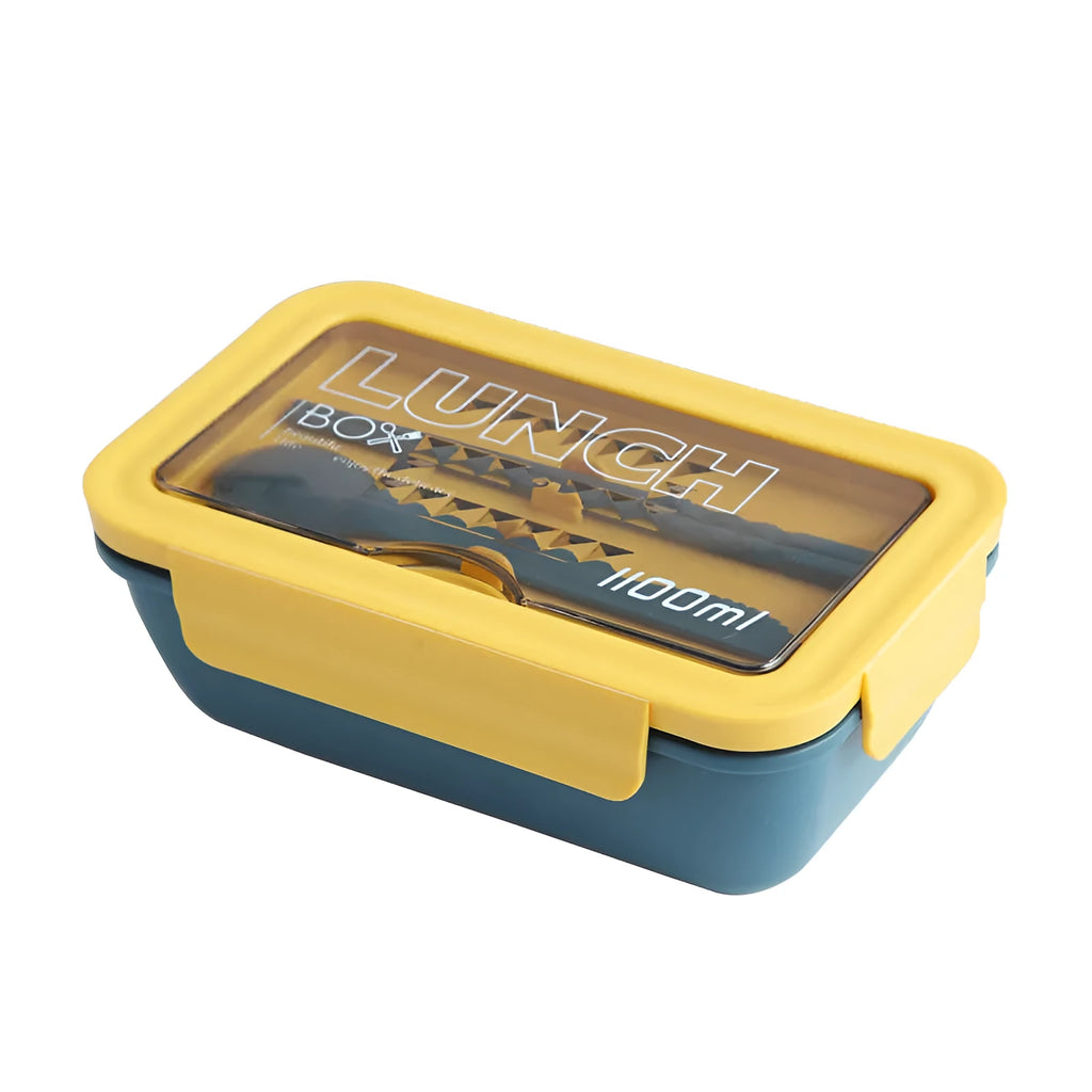 Green Japanese bento box with four separate food compartments and Nordic-style design
