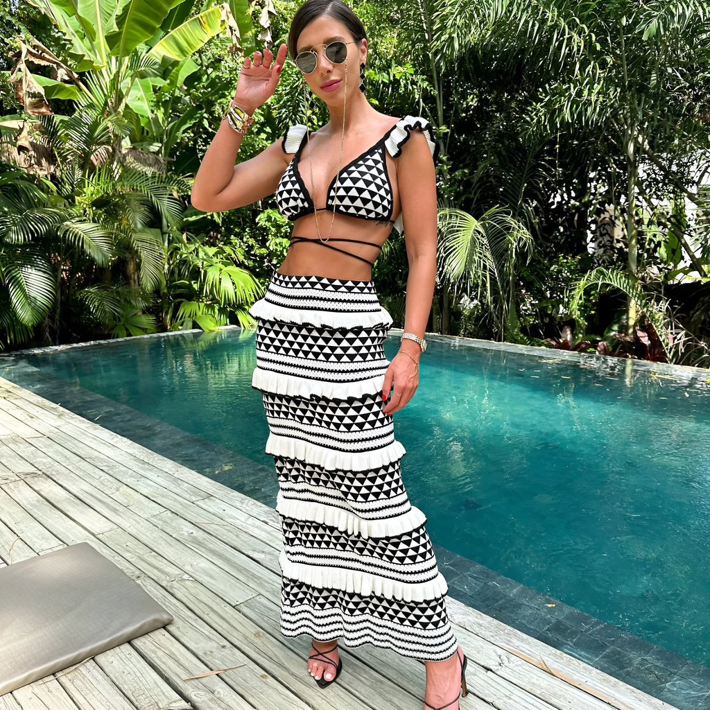 Black and white striped cotton bikini top with ruffles and spaghetti straps paired with matching long knitted skirt