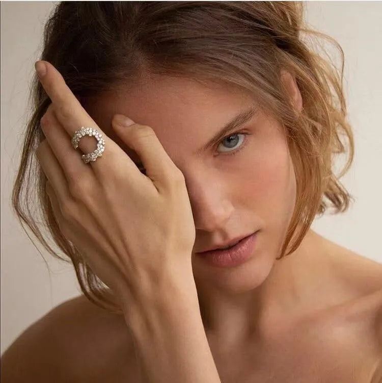 Gradient crescent pearl ring in alloy with silver finish on neutral background