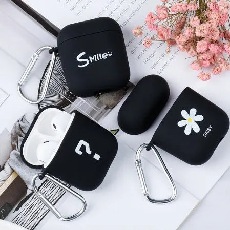 Black and Pink PC plastic protective case covers for AirPods with decorative Flower, Love, and Smiley face designs.