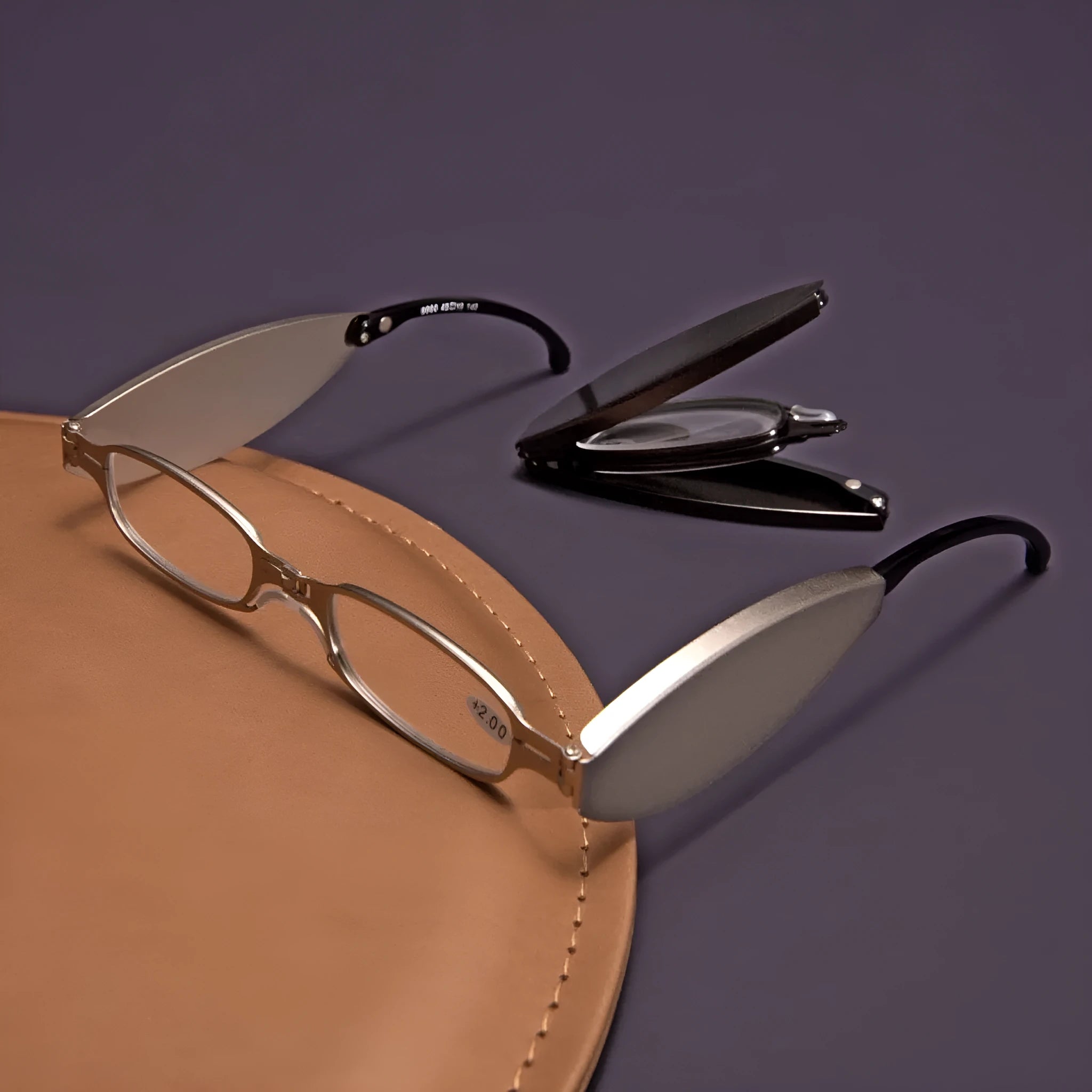 Folding presbyopic glasses with retro ring style frame shown in black and silver colour options