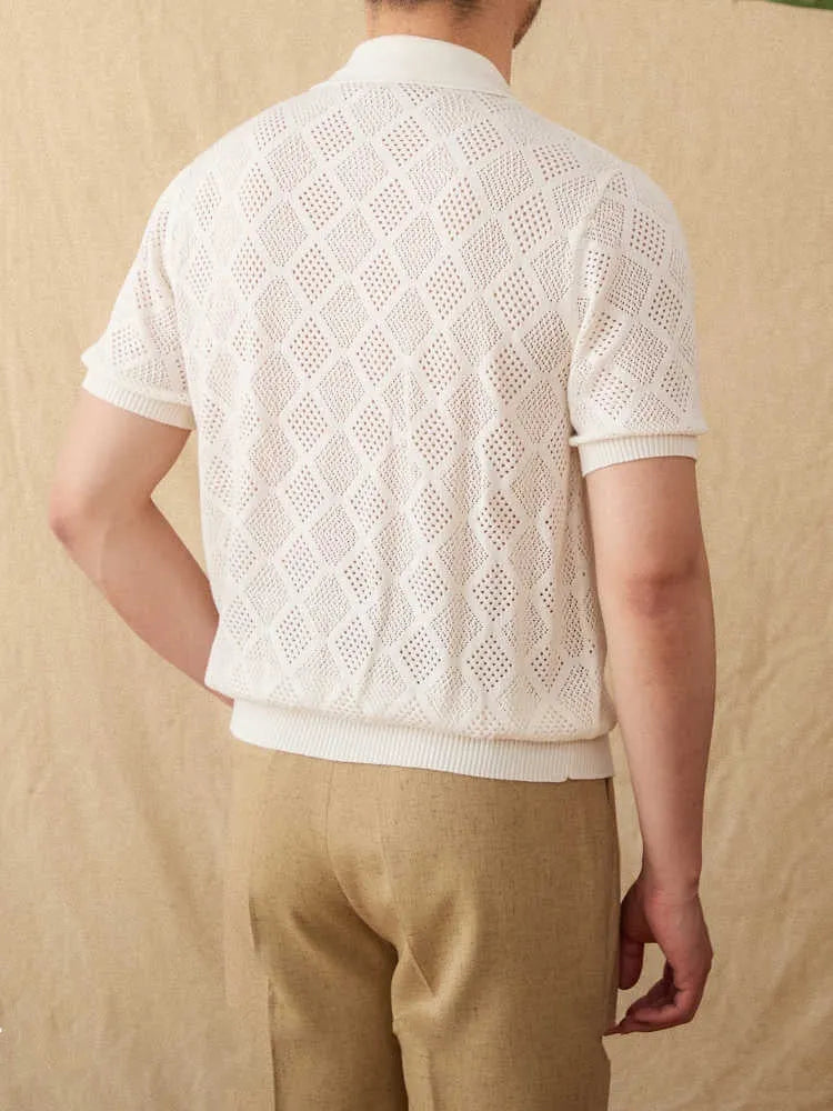 Light brown cotton short-sleeve cardigan with zipper and lapel collar laid flat.
