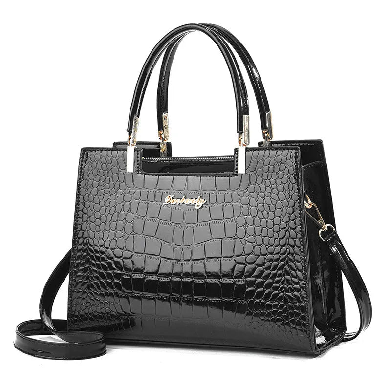 A structured horizontal square one-shoulder handbag in PU leather, shown in a choice of ten colours.