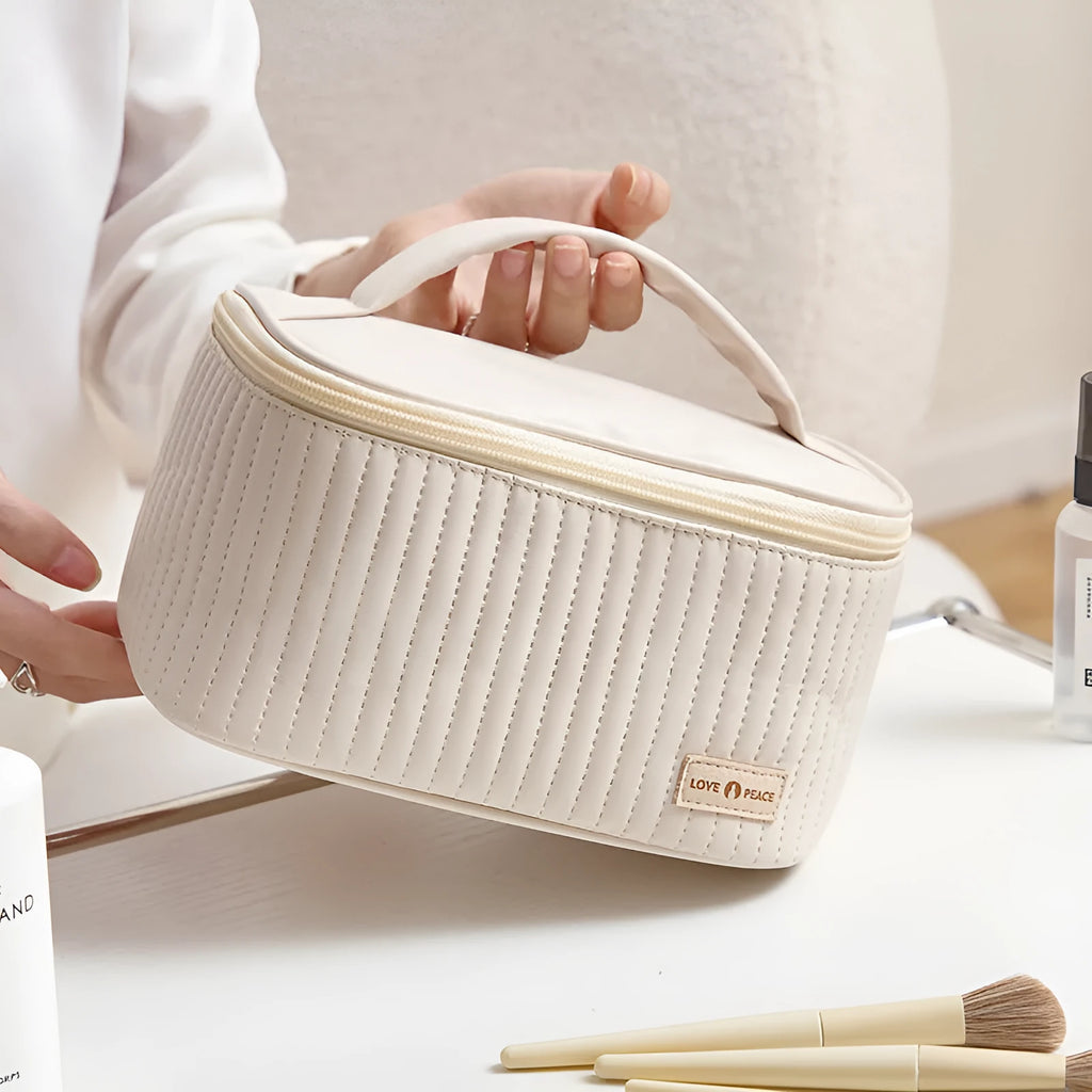 Open-top cake style women's makeup bag in PU leather showing solid colour options