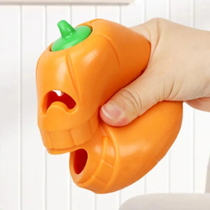 Yellow pumpkin shaped dog chew toy for aggressive chewers made from TPR material