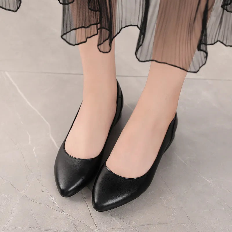 Beige women's pointed-toe flat shoes with a buckle, made from cowhide leather with a rubber sole.