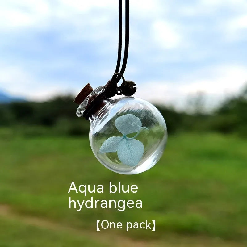 Glass car perfume pendant with preserved flowers in selected colour and diameter