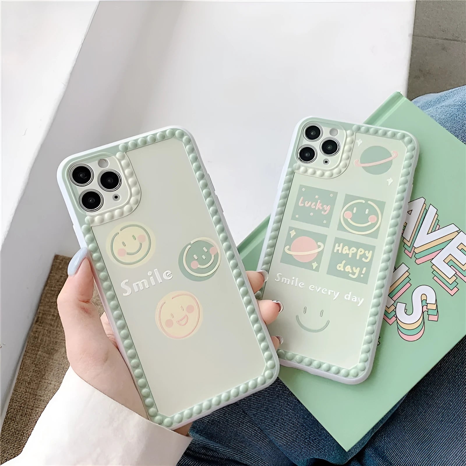 Green iPhone case with geometric smiley face and polka dot patterns, slim TPU back cover design