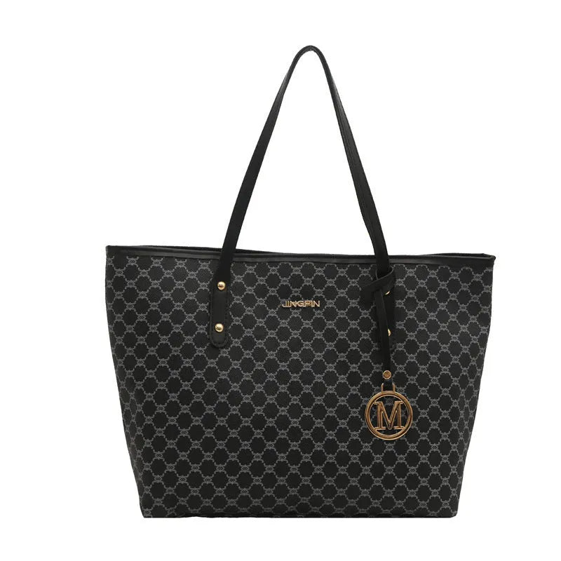 Western style black PU leather shoulder bag with adjustable strap and sewing thread detail.