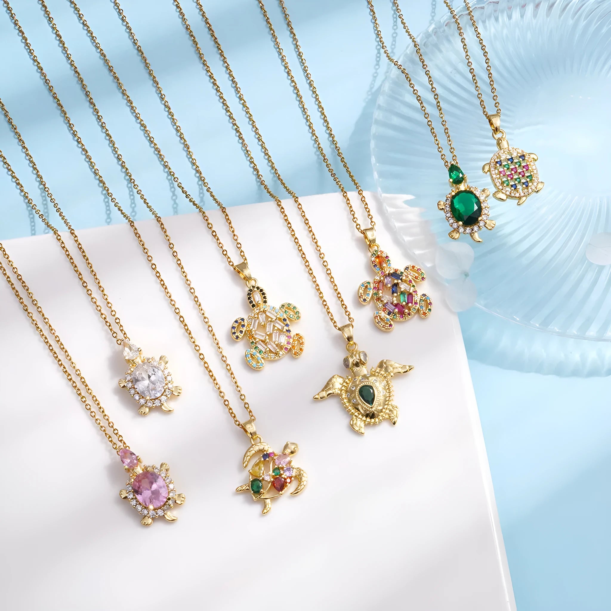 Gold-plated copper sea turtle pendant necklace with mixed gemstone inlay and zirconium encrustation on titanium steel chain