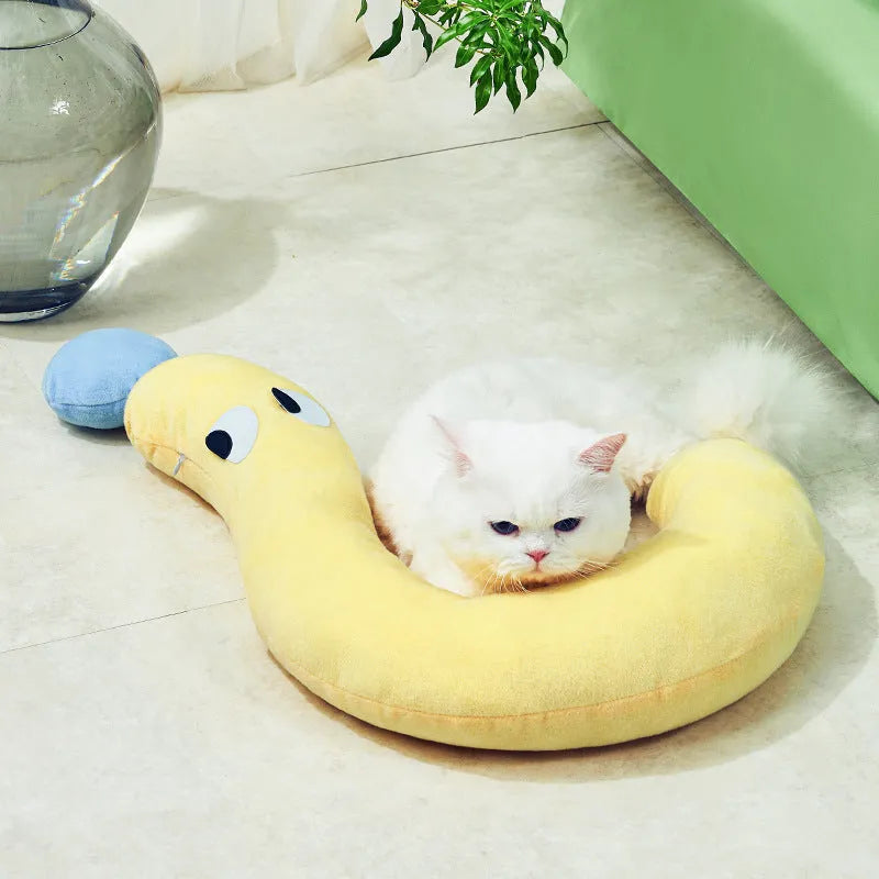 Blue and yellow rectangular pet pillow measuring 62 by 39 centimetres for dogs and cats.