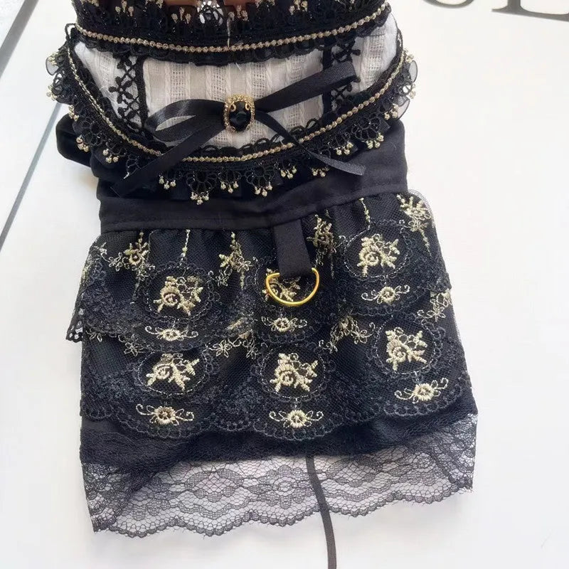 Golden gothic princess skirt costume on a small dog, showing the pet clothing design.