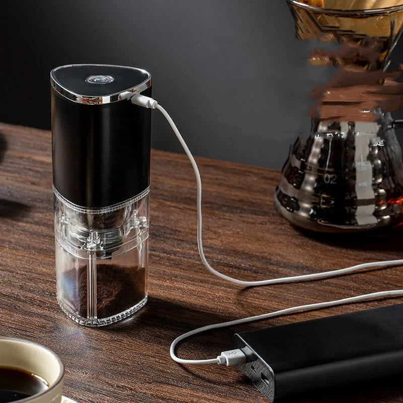 White and black portable electric coffee grinder with ceramic burr and USB charging cable