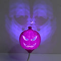 Pumpkin-shaped decorative lamp with USB cable for Halloween and autumn lighting in yellow or purple colours
