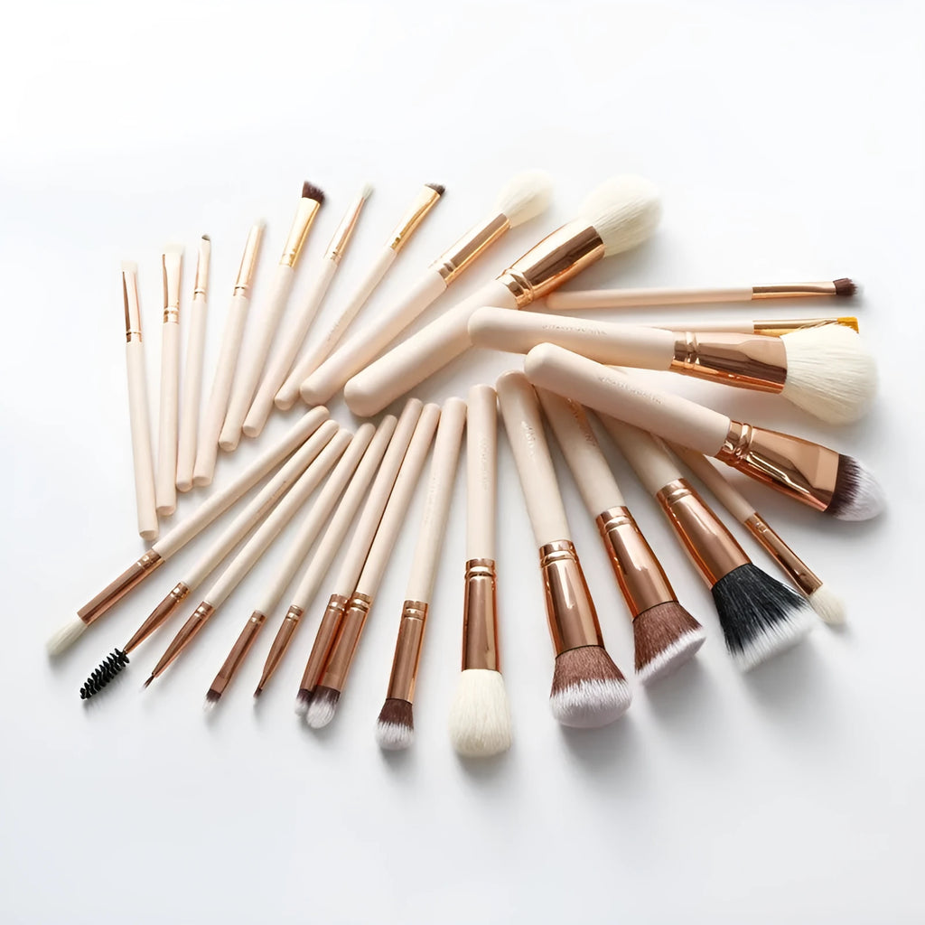 26 pink-handled makeup brushes with wool bristles in a pink PU case