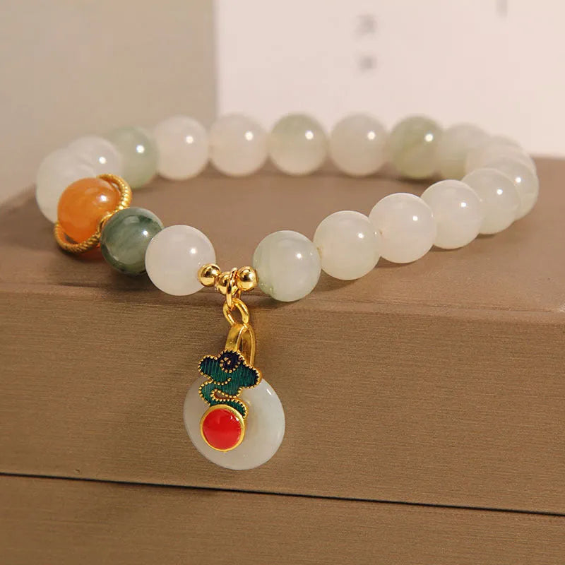 Ice jade colour bracelet with pearl decorations and Xiangyun peace jade buckle