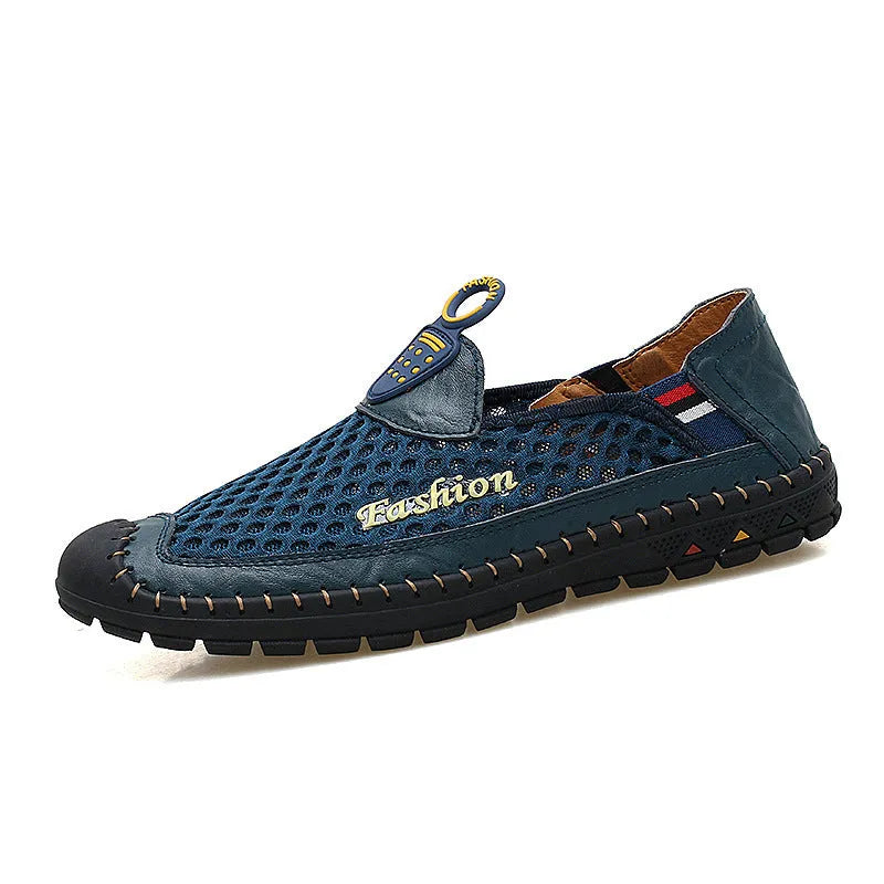 Men's brown casual shoes with mesh upper and rubber sole on a light background.