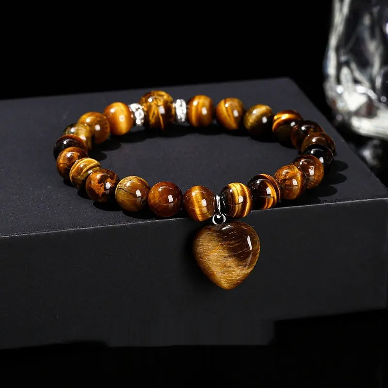 Natural stone bracelet with geometric heart pendant showing 8mm or 10mm beads in crystal colours