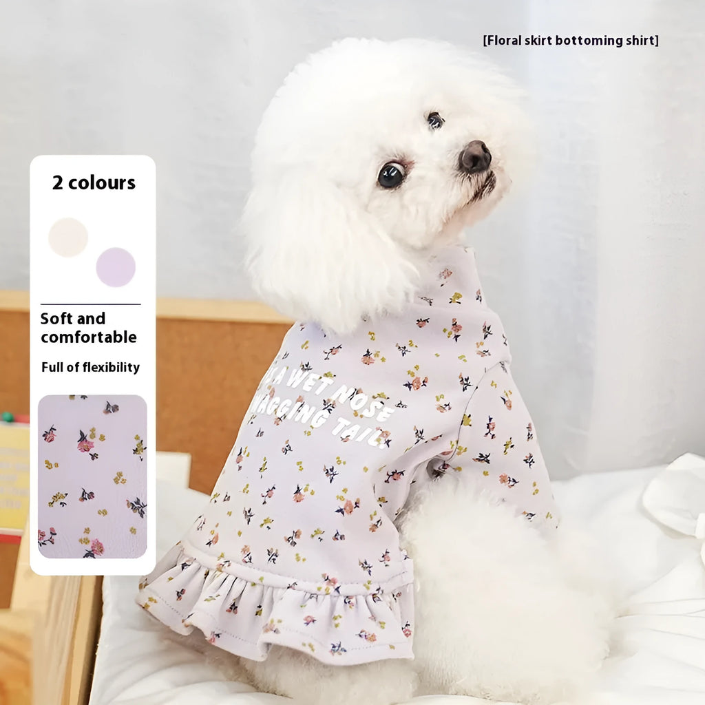 Bichon Frise dog wearing light purple floral undershirt skirt pet clothing