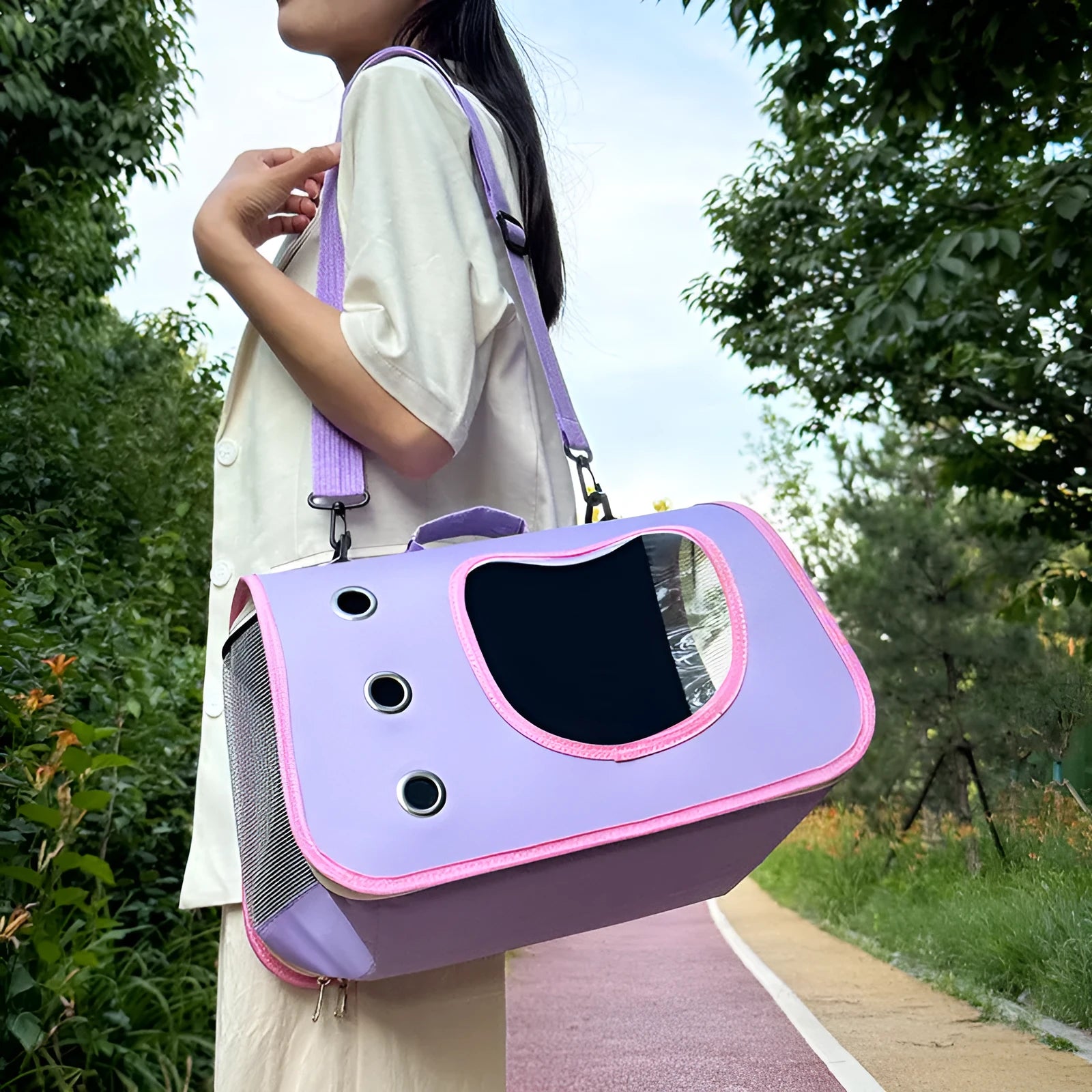 Medium capacity pet outing bag in Oxford cloth available in six colour options with crossbody carrying strap