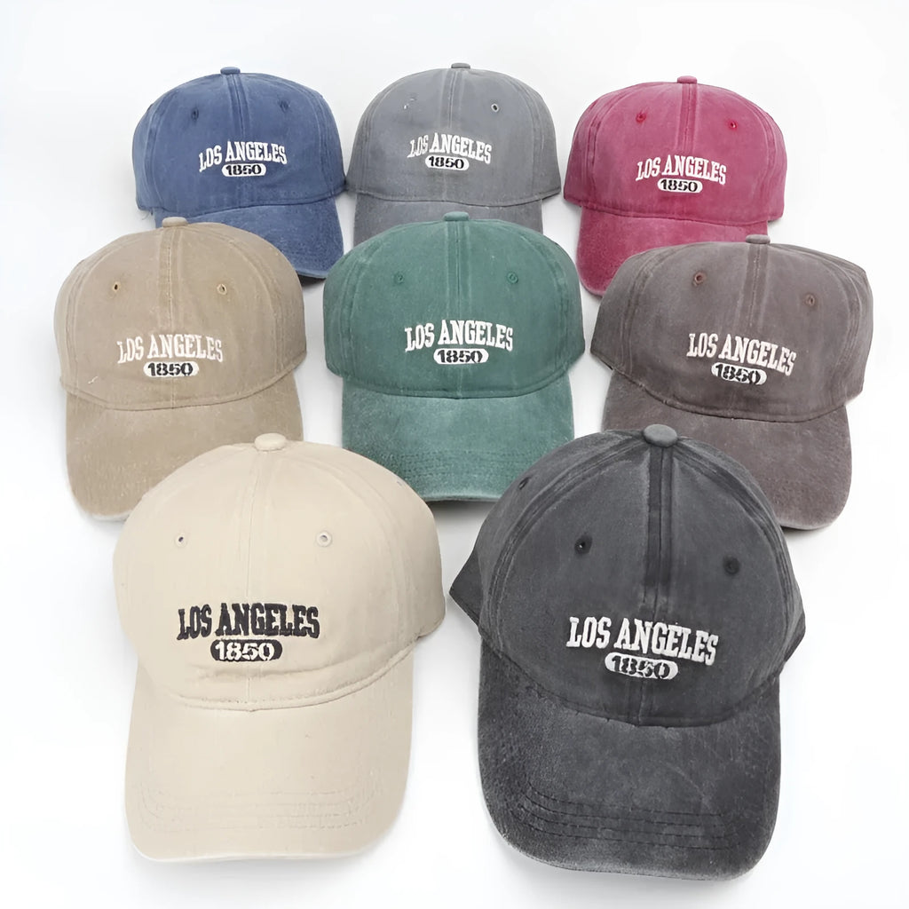 Retro personalised washed distressed embroidered peaked cap in beige with adjustable snapback.