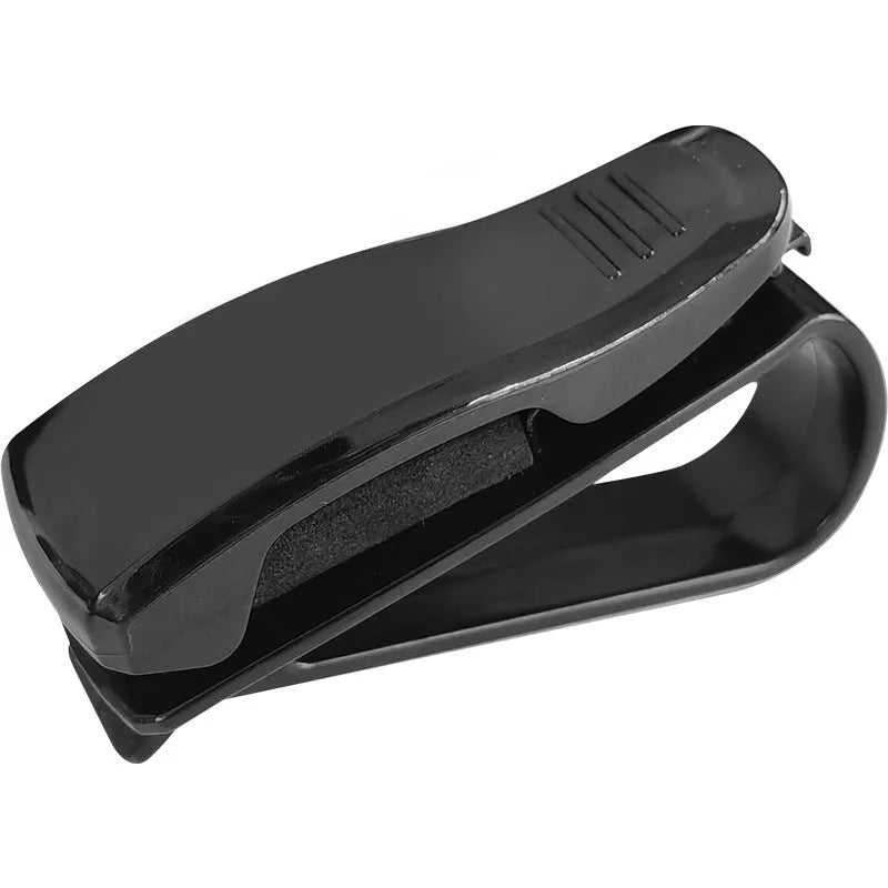 Black plastic clip for mounting glasses and cards on a car sun visor