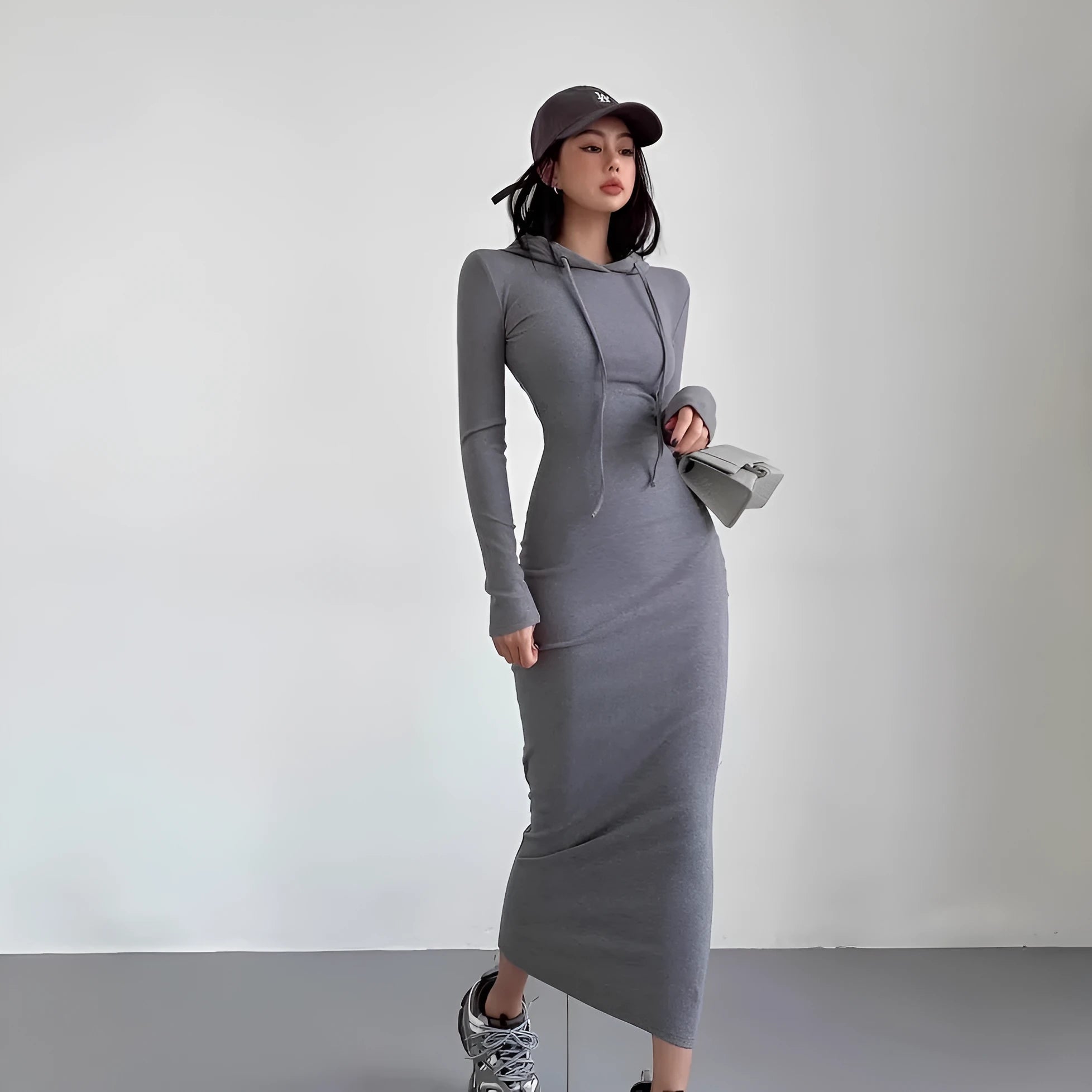 Women's grey hooded long sleeve sheath dress with an over-the-knee length