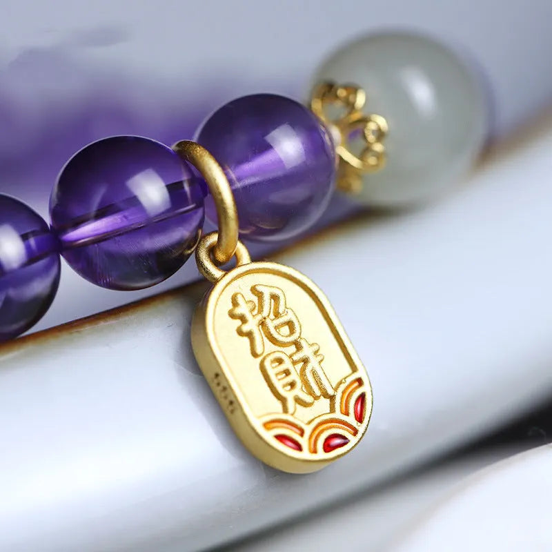 A women's bracelet with purple 8mm amethyst crystal beads arranged in a geometric, national style design.