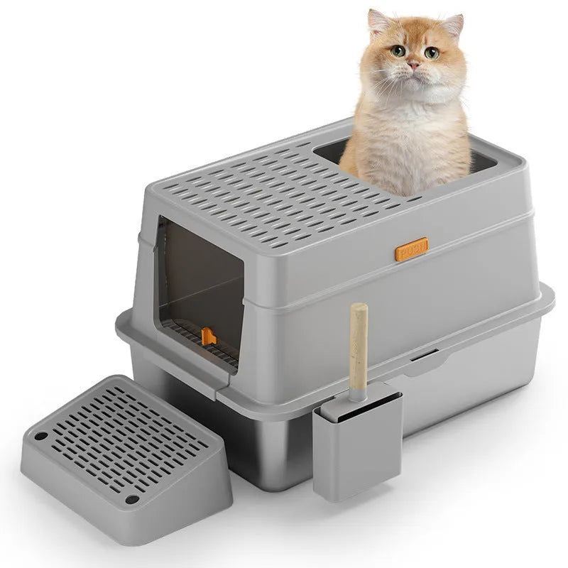 Grey enclosed cat litter box with a foot pedal and stainless steel pan inside