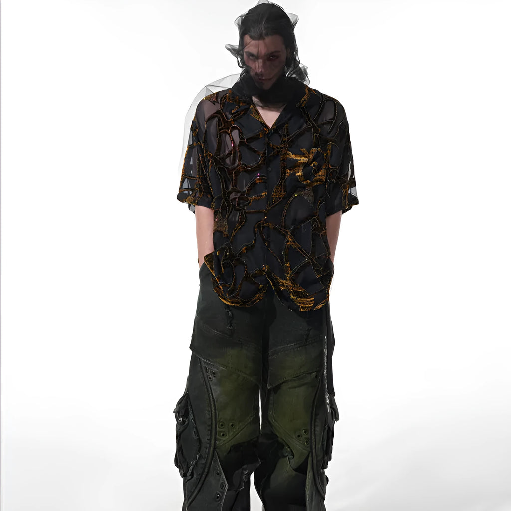 Man's black and grey short-sleeved shirt with translucent snake pattern, loose fit with lapel collar.