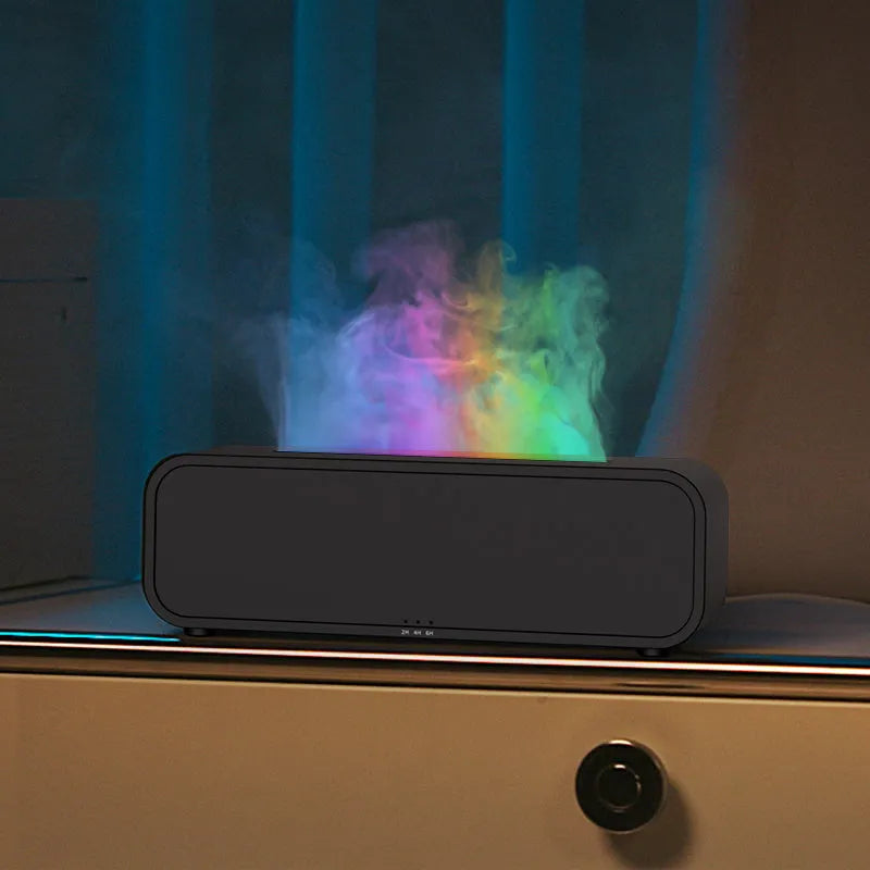 Black and white flame dynamic aroma diffuser with remote control on a wooden table