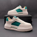 White leisure shoes with green or black detailing, cloth upper and rubber foam sole