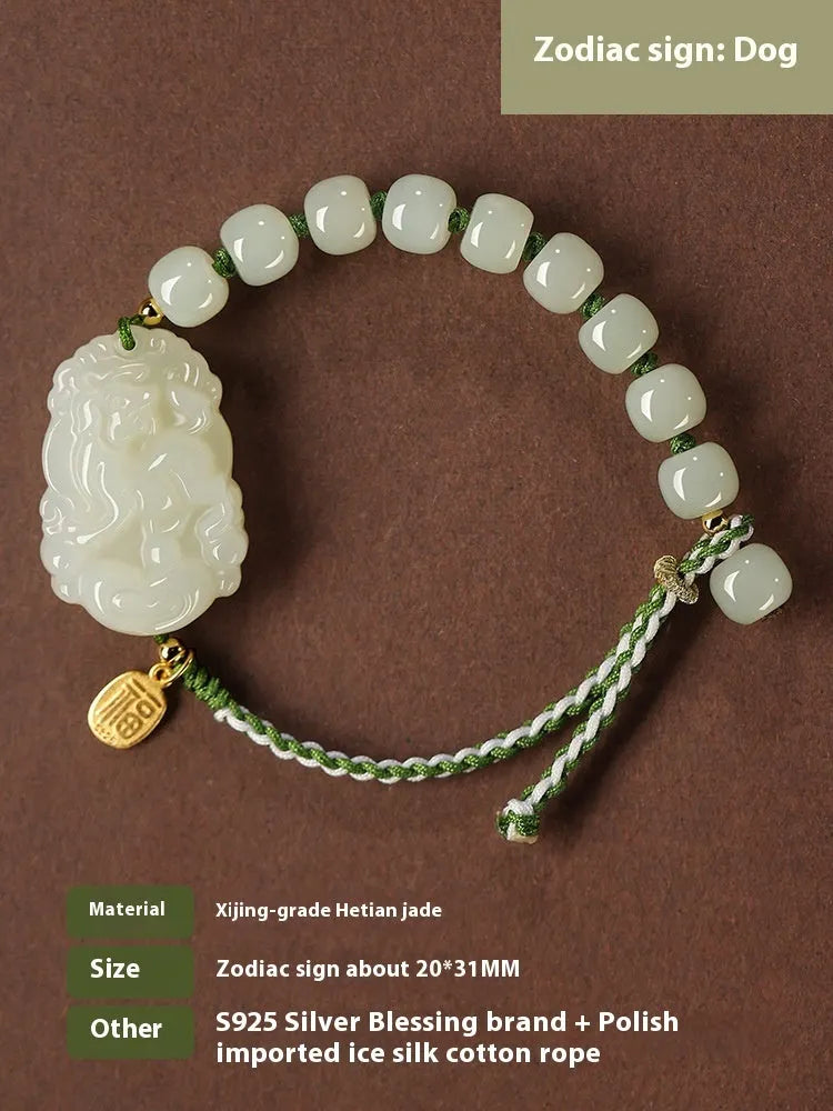 Hetian jade rabbit charm bracelet with sterling silver card on a white ice cotton rope.