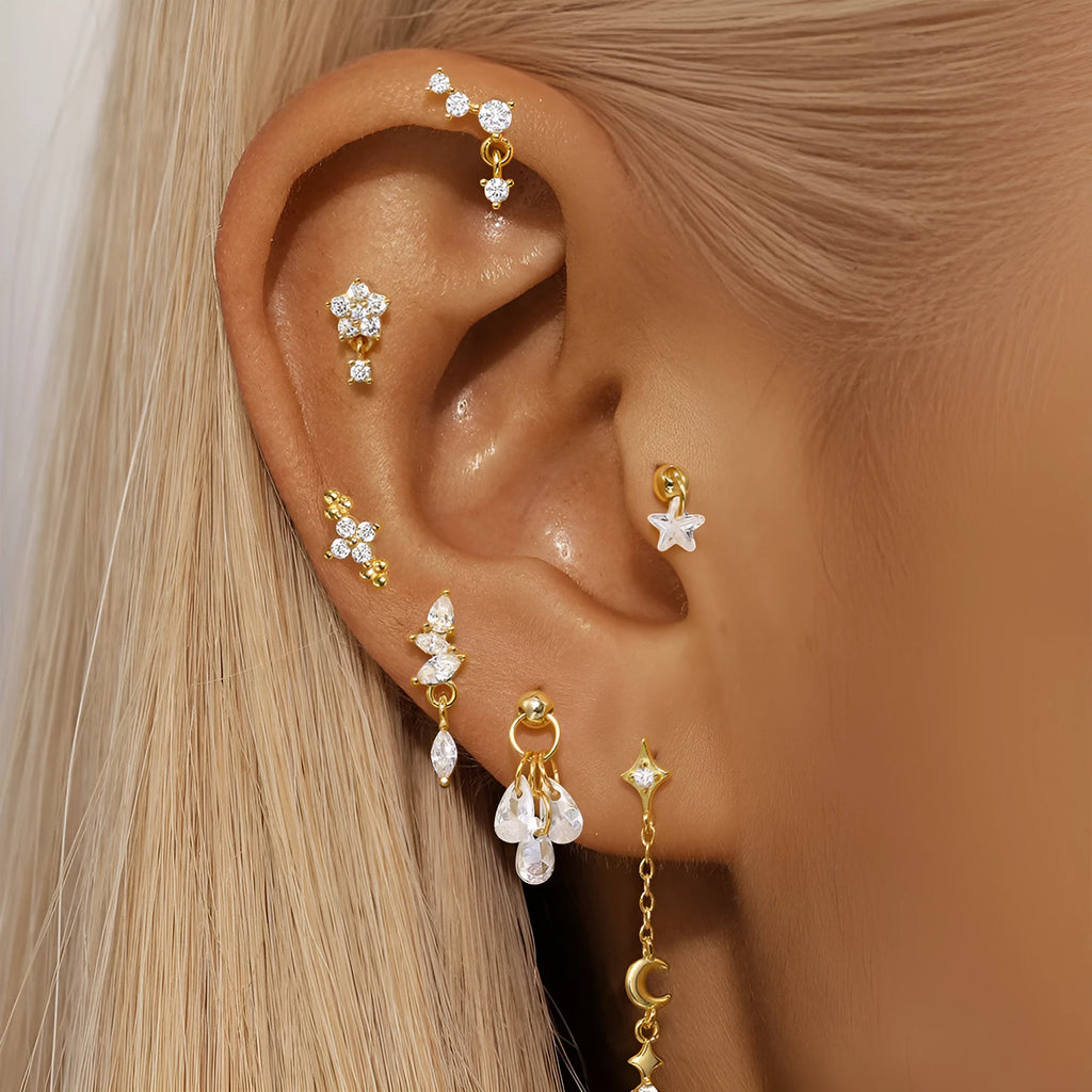 S925 sterling silver geometric moon and star earrings with diamond accents in gold tone.