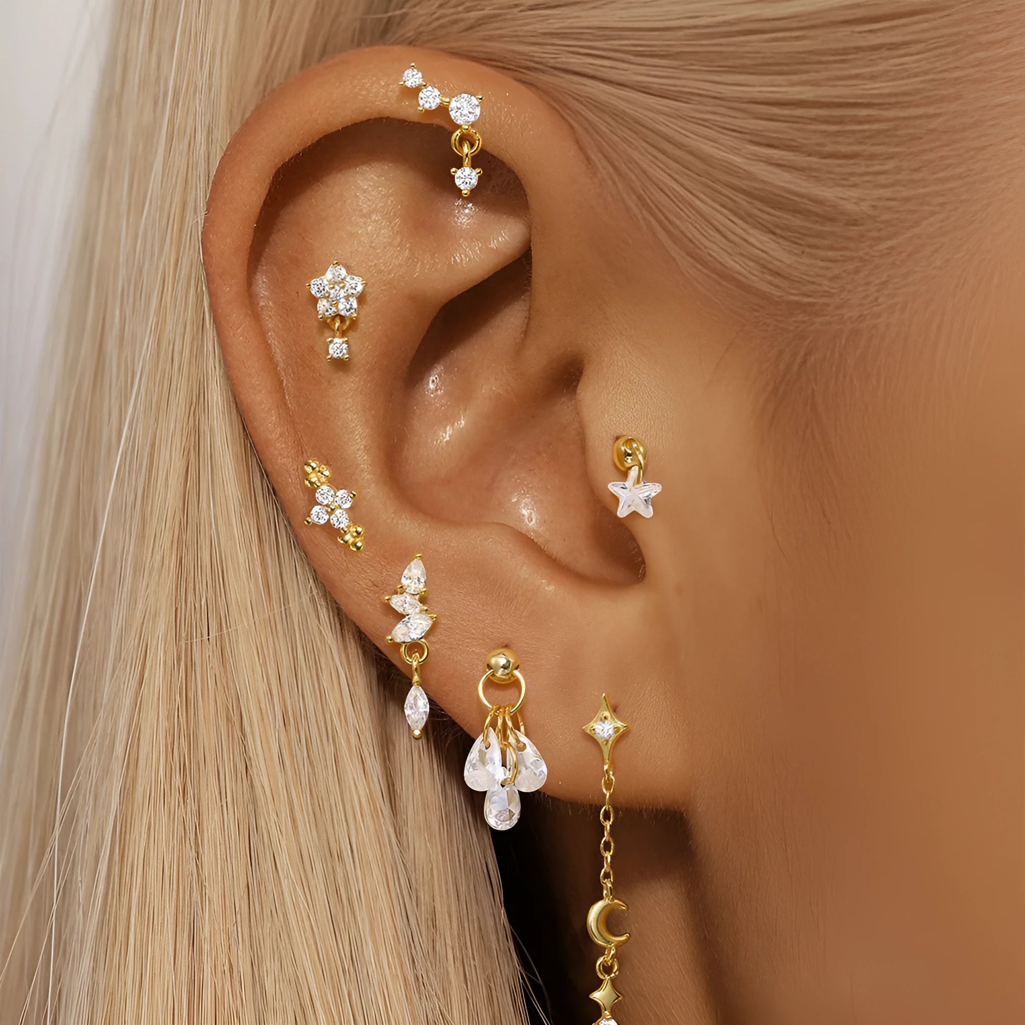 S925 sterling silver geometric moon and star earrings with diamond accents in gold tone.