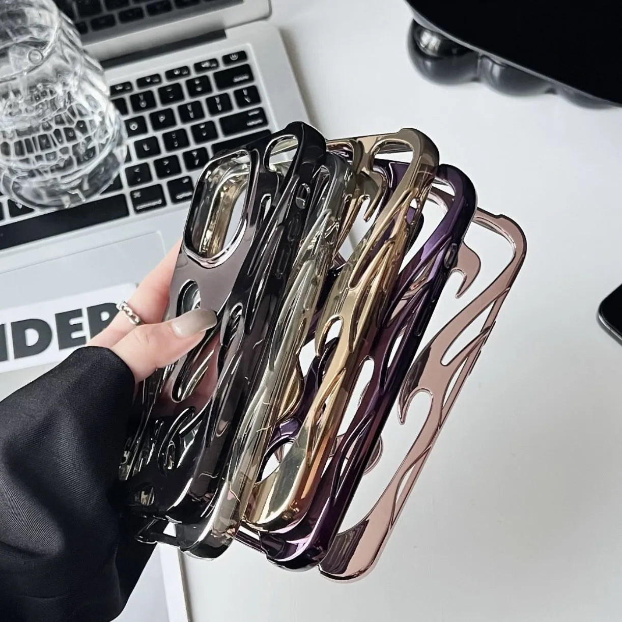 Electroplating hollow flame pattern TPU phone case for Apple iPhone in gold colour.