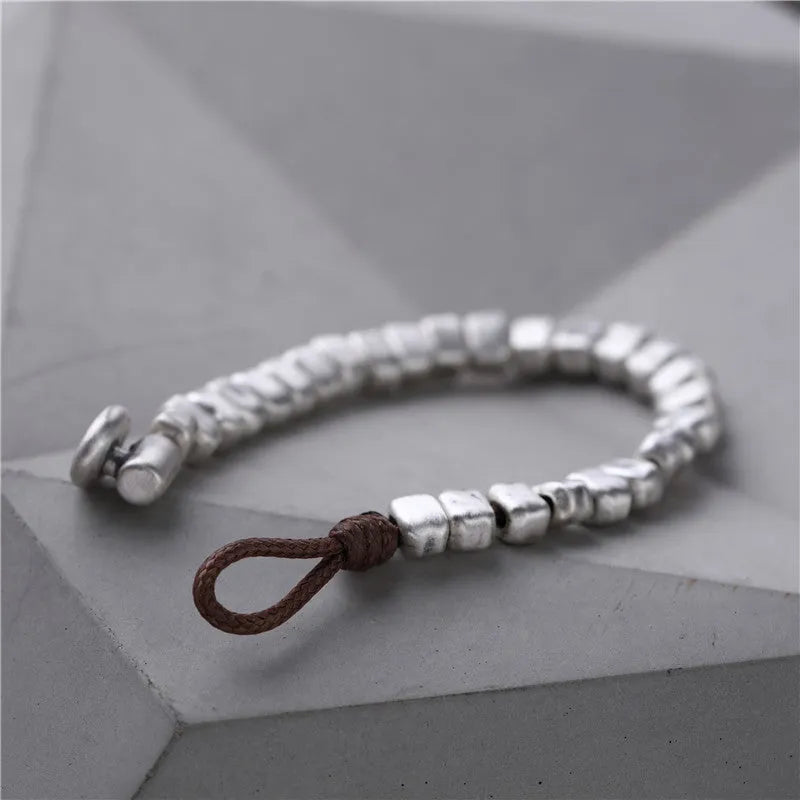 Handmade wooden bracelet with irregular silver square charm on elastic band