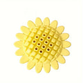 Yellow rubber sunflower-shaped dog chew toy measuring 7 cm across with textured petal surface