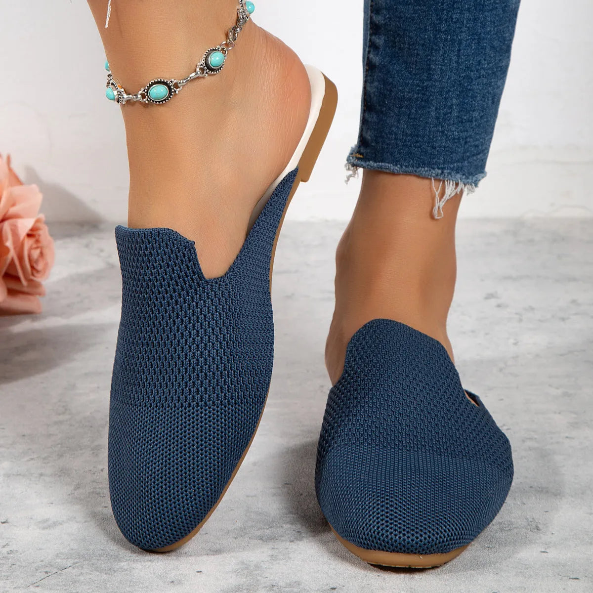 Apricot coloured casual mesh slip-on sandals with a round toe and flat rubber sole.