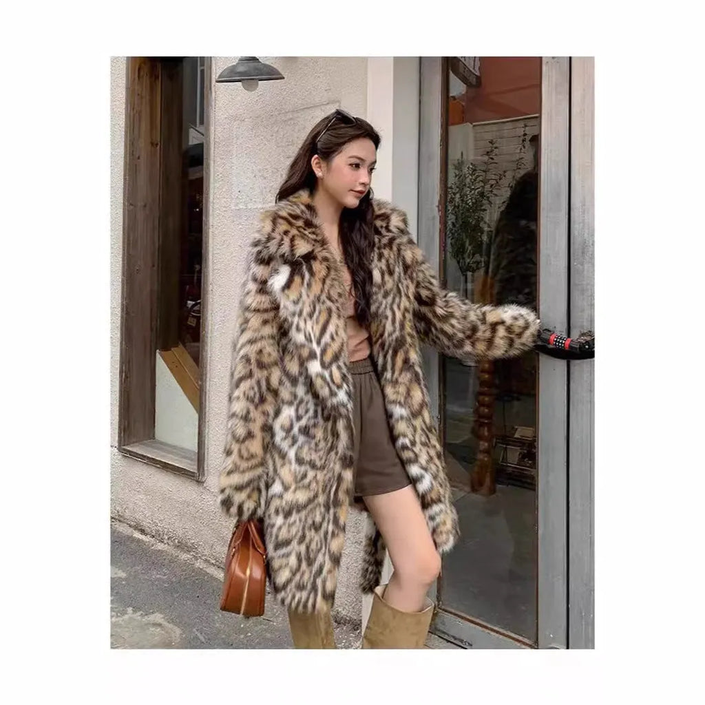 A long faux fur coat with a thick fur collar and pockets, shown in a street-fashion style.
