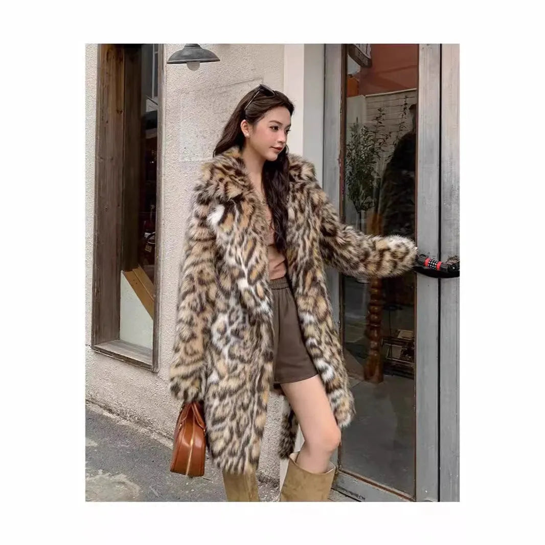 A long faux fur coat with a thick fur collar and pockets, shown in a street-fashion style.