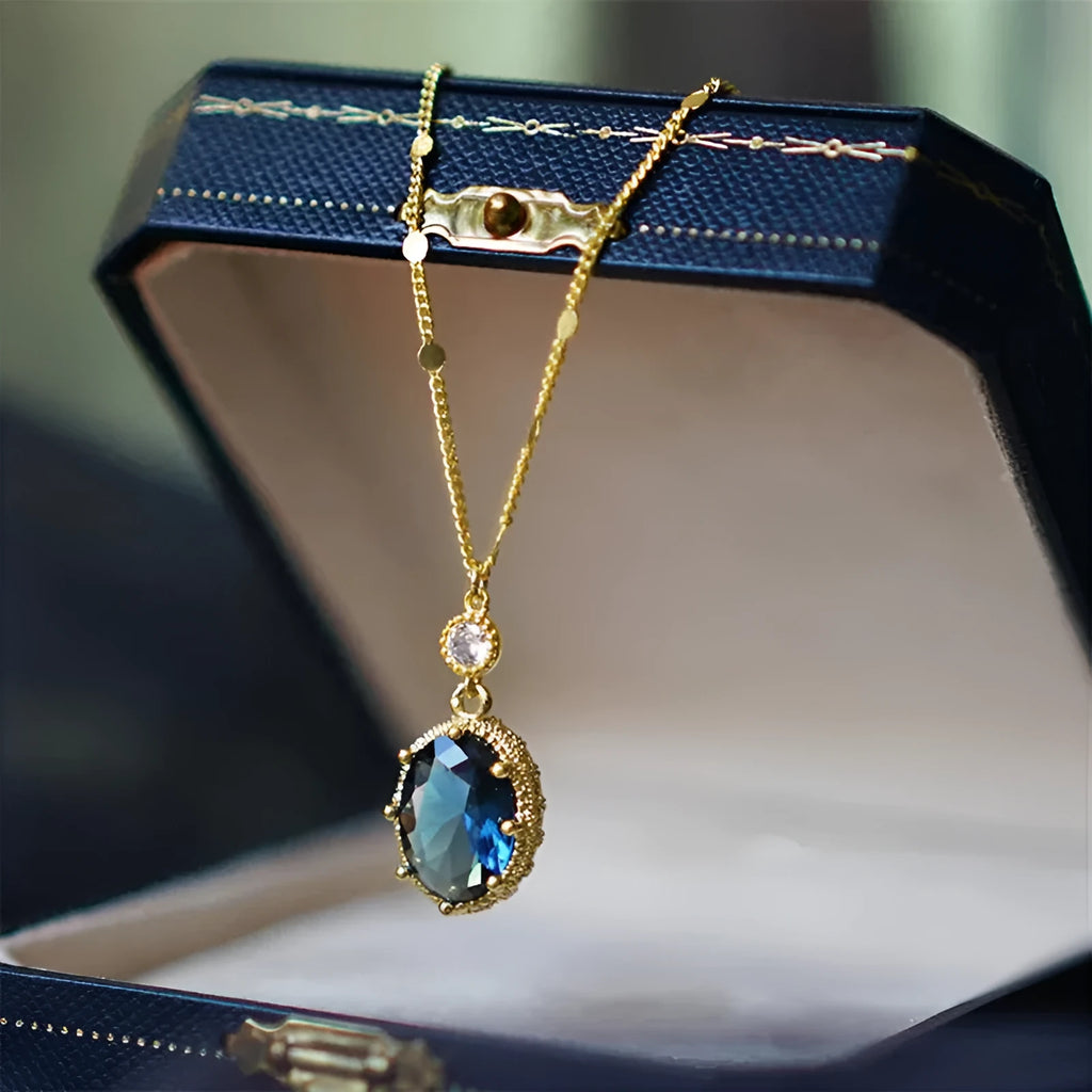 Gold geometric pendant necklace on a model, showcasing French retro design.