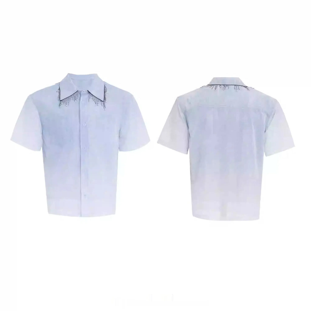 Blue and white gradient short-sleeved loose fit shirt on a hanger.