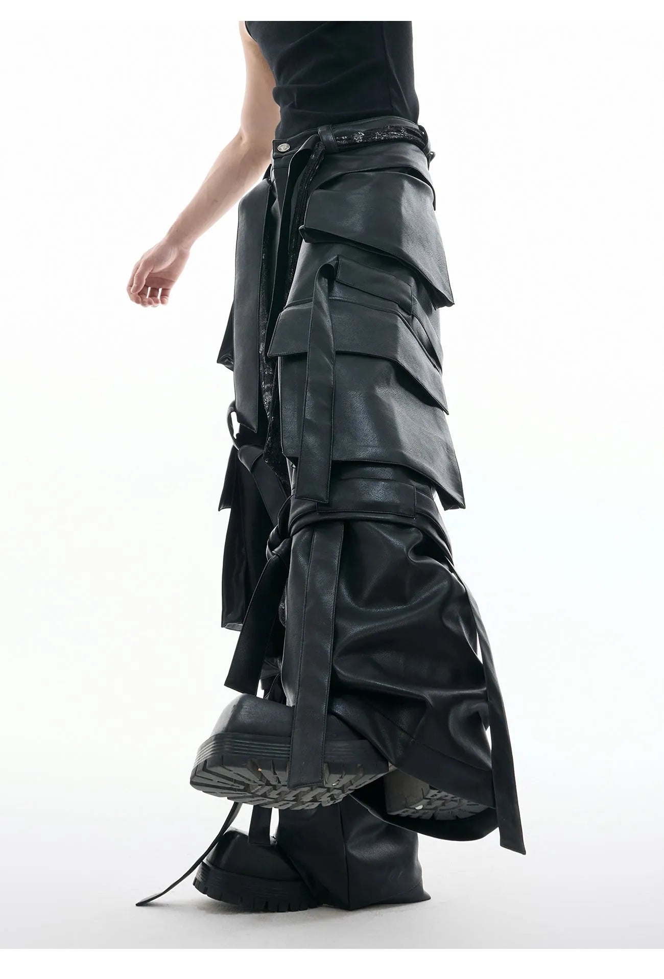 Black loose-fit quilted trousers with multiple pockets and PU leather composite fabric