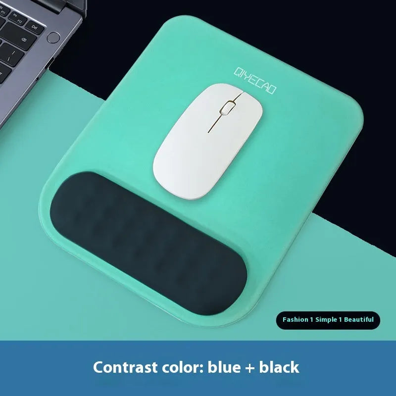Ergonomic mouse pad with raised wrist support in a choice of contrast colour patterns on a desk.
