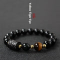 Handmade obsidian bracelet with 10mm tiger eye agate beads in unisex design