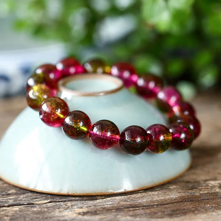Women's handmade watermelon crystal bead bracelet showing options in different bead sizes.
