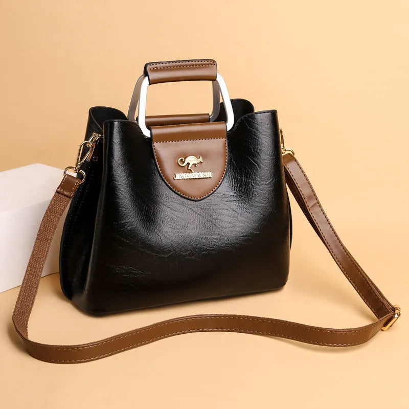 Large capacity PU leather tote bag in black, crossbody style, horizontal square shape with sewing line details